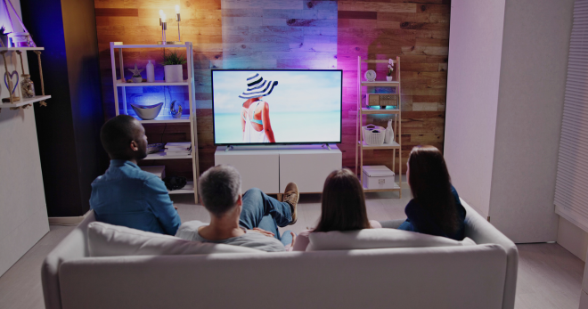 Family enjoying Watch Premium Cable TV